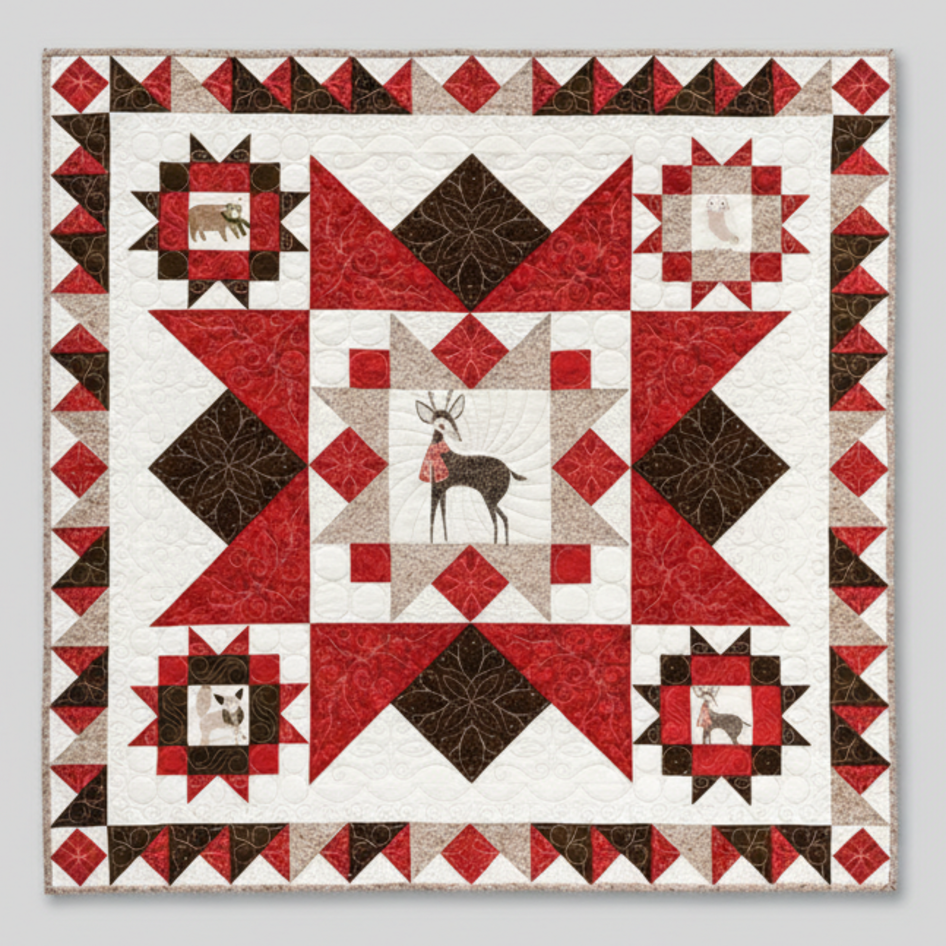 Rustic panel quilt with star blocks and animal motifs in warm neutral tones