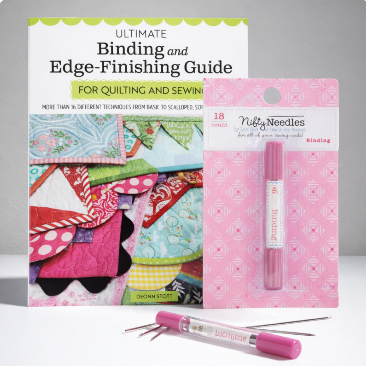 Lori Holt Binding Nifty Needles set shown with Ultimate Binding and Edge-Finishing Guide book for quilting and sewing