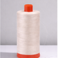 Aurifil Mako Cotton Thread 50wt in Aluminum, 1300-yard spool of long-staple Egyptian cotton on orange base.