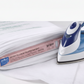 Iron and Pellon fusible web on a white background