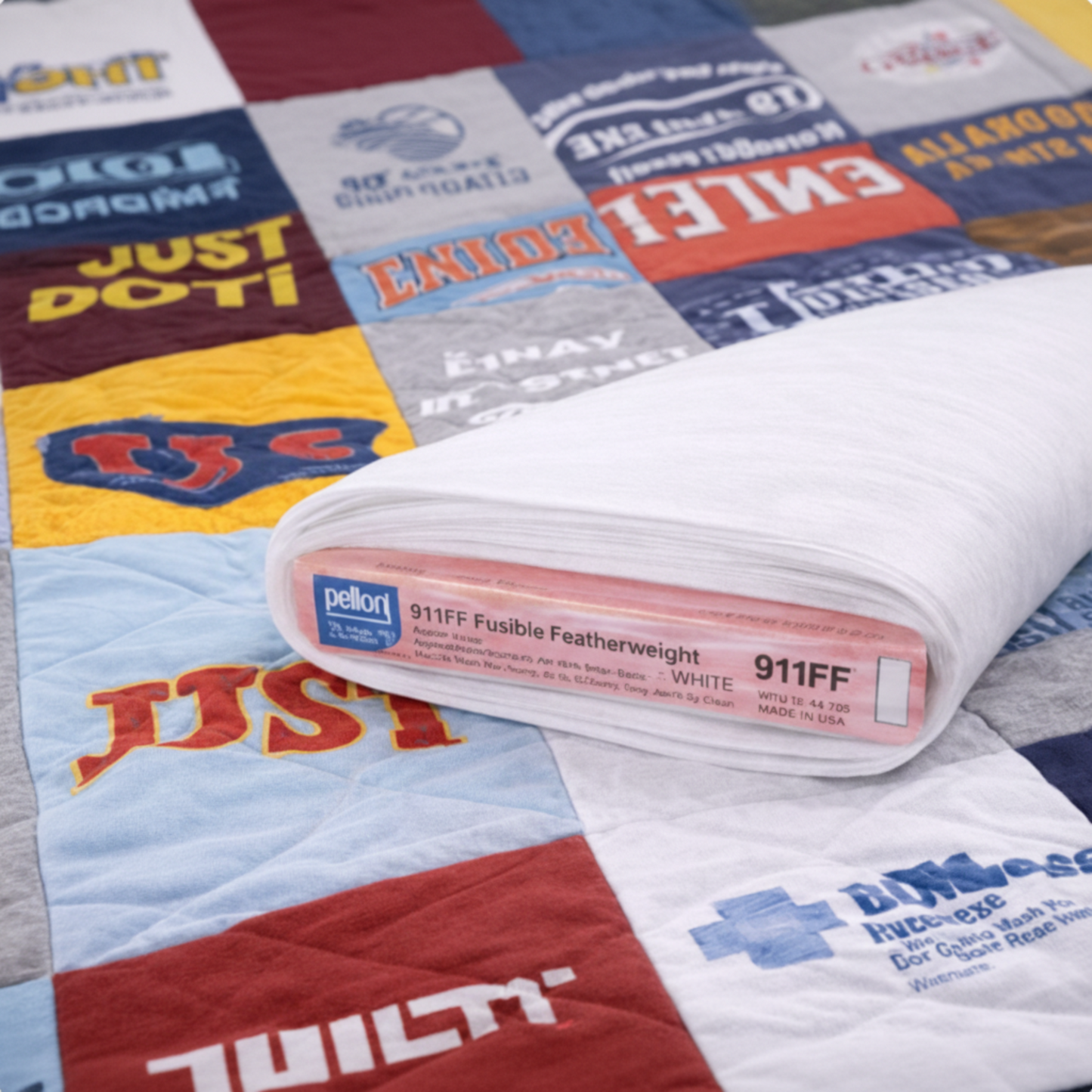 Roll of Pellon fusible interfacing on a T-shirt quilt background