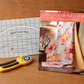 Quick Curve Ruler paired with One Wonderful Curve quilting book, highlighting curved quilt design possibilities.