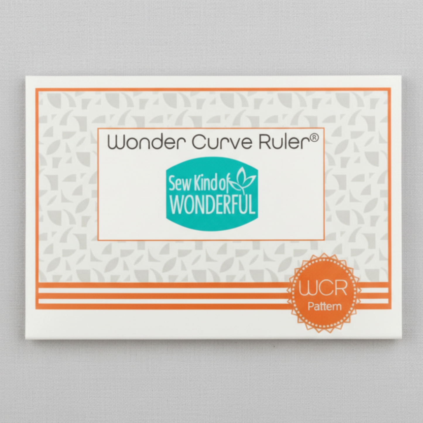 Wonder Curve Ruler in original packaging by Sew Kind of Wonderful, labeled as a WCR quilting pattern ruler.