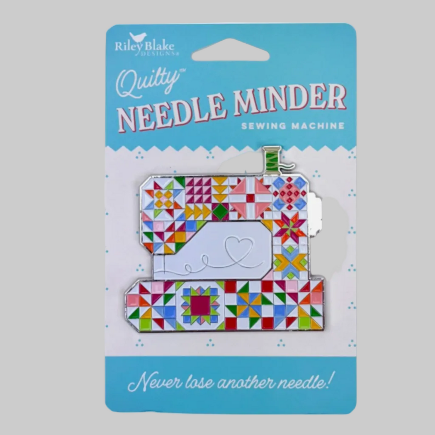 Riley Blake Designs Quilty sewing machine needle minder displayed on original retail packaging