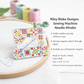 Riley Blake Designs sewing machine needle minder with magnetic needle holder on embroidery hoop