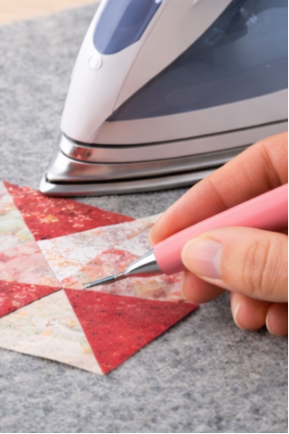 Preparing quilt block pieces for pressing after marking lines with fabric marking pencil.