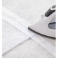 Fusible batting tape being ironed onto batting seam to join layers for quilting