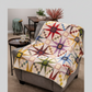 Quilt on chair – Solarium star quilt draped on armchair – colorful patchwork star quilt home decor