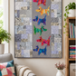 Modern ModDog quilt wall hanging displayed in cozy sewing room with colorful applique dog design and quilting décor