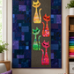 Modern ModCat applique quilt wall hanging displayed in craft room with vibrant cat designs and colorful quilting fabrics