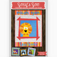 Zoey’s Zoo quilt pattern cover with colorful lion applique baby quilt and animal-themed quilt blocks by Sassafras Lane Designs