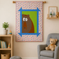 Bear-themed Zoey’s Zoo quilt wall hanging displayed in a cozy kids room with neutral nursery decor and teddy bear chair