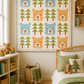 Baby Bear quilt wall hanging in a neutral kids bedroom with teddy bears, green bedding, and woodland décor
