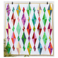 Modern Diamond Daze quilt with colorful geometric diamond blocks on a white background, quilted with flowing texture and finished with a yellow binding, displayed hanging on a white wall.