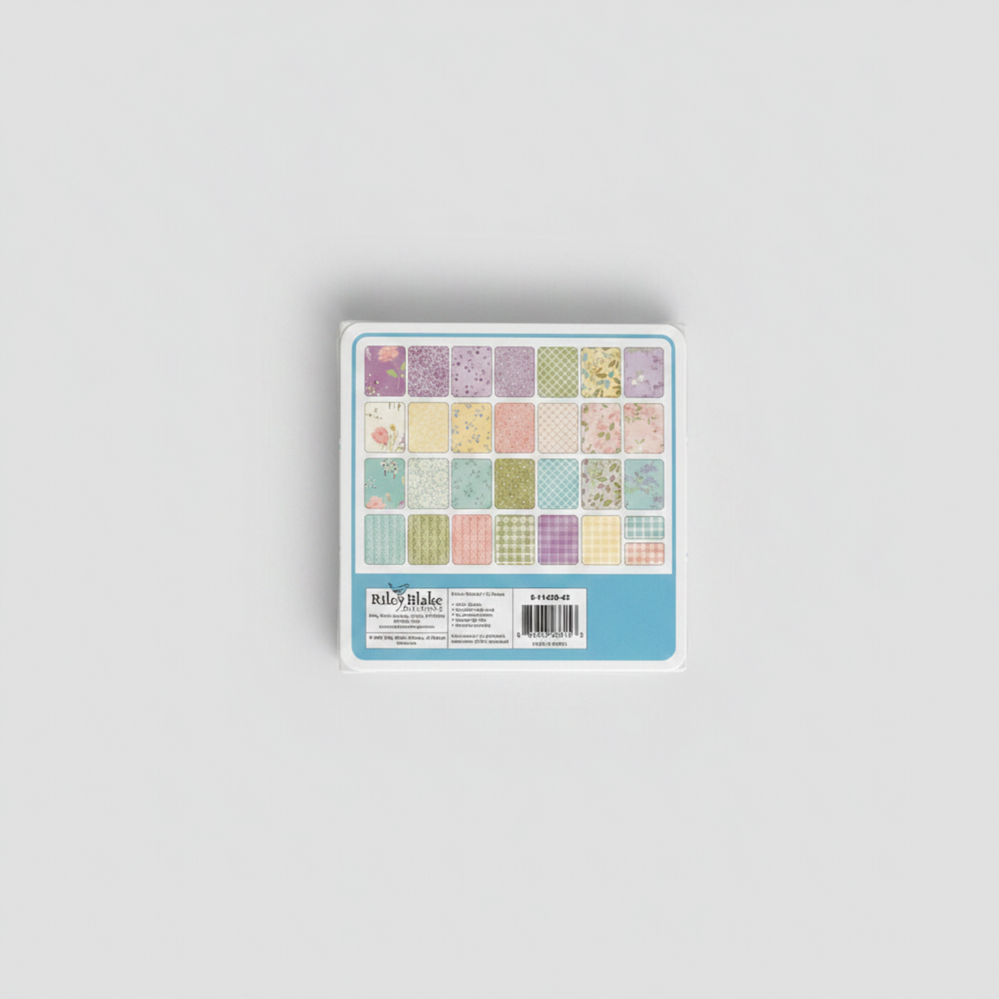 Adel in Spring Charm Pack by Sandy Gervais for Riley Blake Designs – back label showing 42-piece 5" x 5" swatch grid with pastel florals, checks and coordinates, SKU 5-11420-42