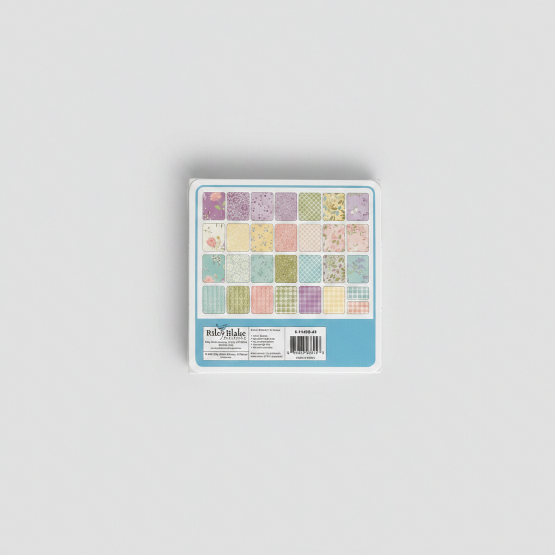 Adel in Spring Charm Pack by Sandy Gervais for Riley Blake Designs – back label showing 42-piece 5" x 5" swatch grid with pastel florals, checks and coordinates, SKU 5-11420-42
