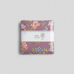 Adel in Spring Charm Pack by Sandy Gervais for Riley Blake Designs – factory-sealed 42-piece 5" x 5" cotton charm squares in lavender with pink roses and floral garden prints