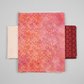 Allure Orange Shadow Flowers quilting cotton fabric by Jason Yenter for In The Beginning Fabrics shown in a coordinate stack with Allure Peach Lattice and Allure Red Lanterns – allover tonal shadow floral in coral, orange, red, magenta, and pink watercolor wash, 100% cotton, 3 yard cut