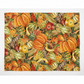 Autumn Celebration Multi Vegetables quilting cotton — close-up flat lay showing a lush allover harvest print with orange pumpkins, striped gourds, Indian corn, red and green apples, acorns, wheat, red berries, and fall oak leaves in deep orange, amber, green, and rust on a dark olive ground. 100% cotton, 43–44" wide.