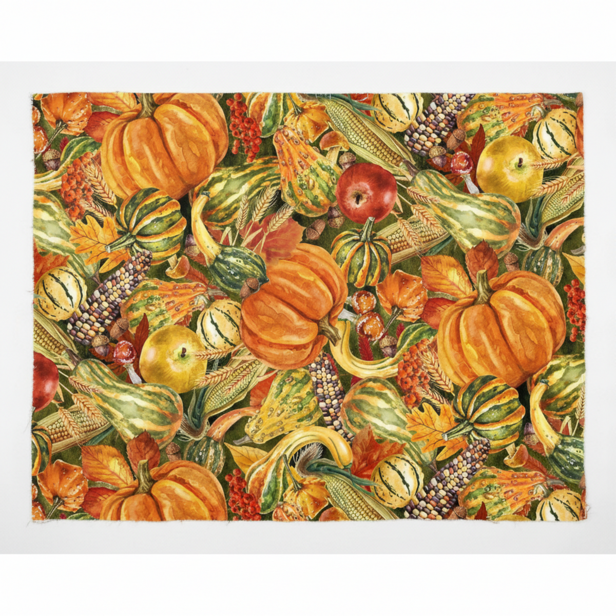 Autumn Celebration Multi Vegetables quilting cotton — close-up flat lay showing a lush allover harvest print with orange pumpkins, striped gourds, Indian corn, red and green apples, acorns, wheat, red berries, and fall oak leaves in deep orange, amber, green, and rust on a dark olive ground. 100% cotton, 43–44" wide.