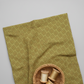 Golden Era Wavy Daisy Green by Paula Barnes for Marcus Fabrics — sage-olive green quilting cotton with wavy daisy motif styled with wicker basket and thread spools, 100% cotton — shop at IraRobi Quilts