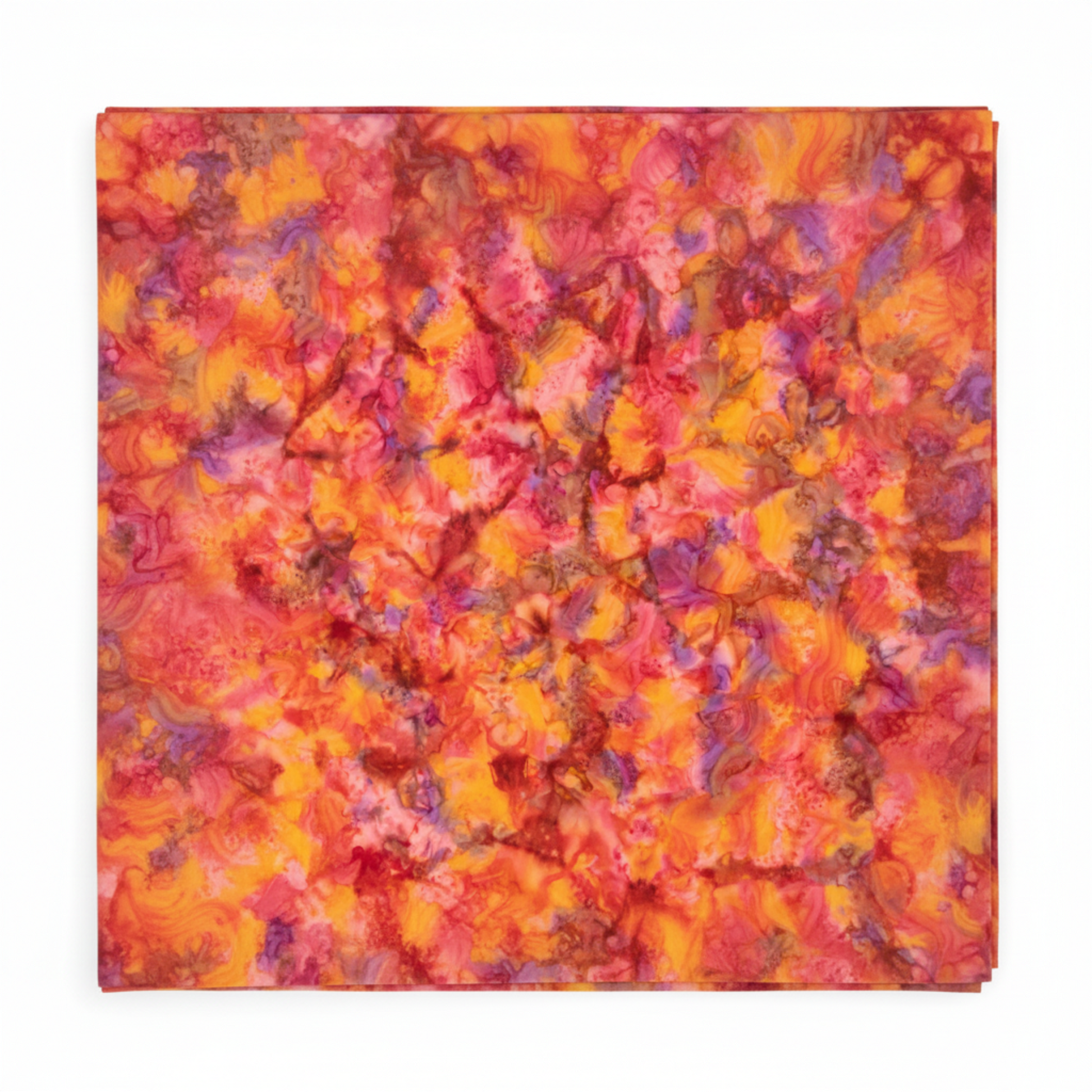 Expressions Batiks Hand-Dyes Bouquet quilting cotton fabric by Riley Blake Designs folded into a neat square showing vibrant multicolor hand-dyed batik with warm golden orange base and bold splashes of hot pink, magenta, crimson red, soft lavender, and peachy blush – a stunning focal blender with exceptional tonal range, 100% cotton batik, 43–44" wide