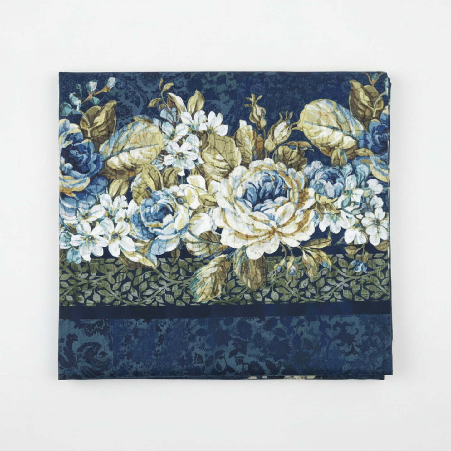 Carpet Bag Romance Blue Border Print quilting cotton fabric folded to show lush cascading floral garland stripe – large ivory and blue roses, white hydrangeas, and olive foliage on deep navy damask ground with coordinating olive leaf vine border by Jason Yenter for In The Beginning Fabrics, 100% cotton, 3 yard cut