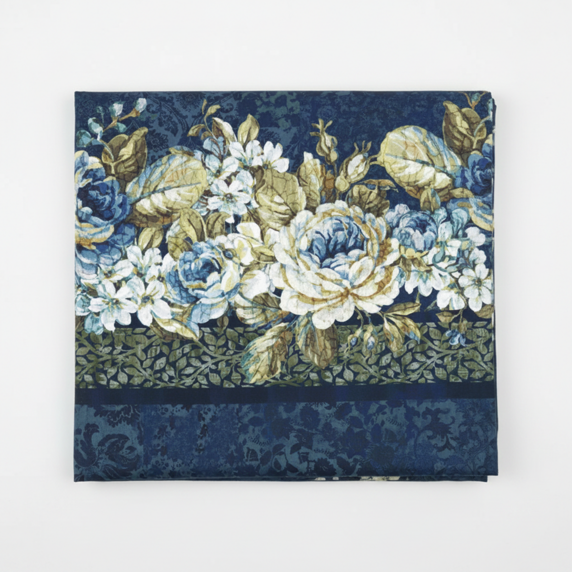 Carpet Bag Romance Blue Border Print quilting cotton fabric folded to show lush cascading floral garland stripe – large ivory and blue roses, white hydrangeas, and olive foliage on deep navy damask ground with coordinating olive leaf vine border by Jason Yenter for In The Beginning Fabrics, 100% cotton, 3 yard cut