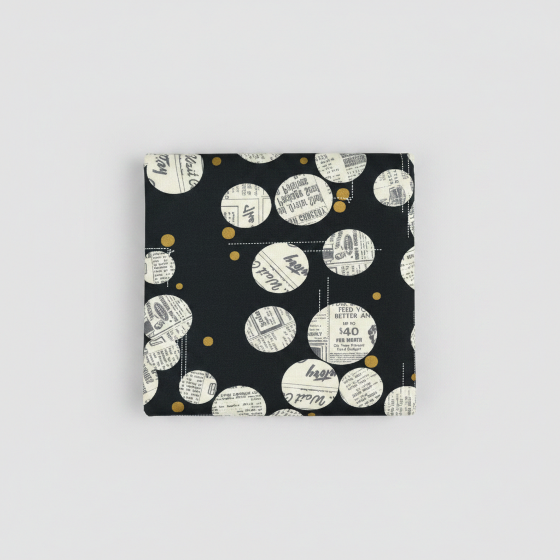 Celestial News Dropping Onyx quilt fabric by Zen Chic for Moda Fabrics, neatly folded on light grey background showing full print repeat
