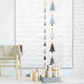 Essentials Connect The Dots Gray quilting cotton by Susan Winget for Wilmington Prints — pictured as the background in a modern Scandinavian Christmas tree wall hanging quilt with geometric stacked trees in grey, charcoal, white, and cream with gold star accents