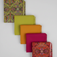 What If Good Vibes Gold/Multi fabric staircase with Interwoven Citron, Marigold, Magenta and Radio Star Red/Multi — quilting color palette by Paula Nadelstern for Benartex