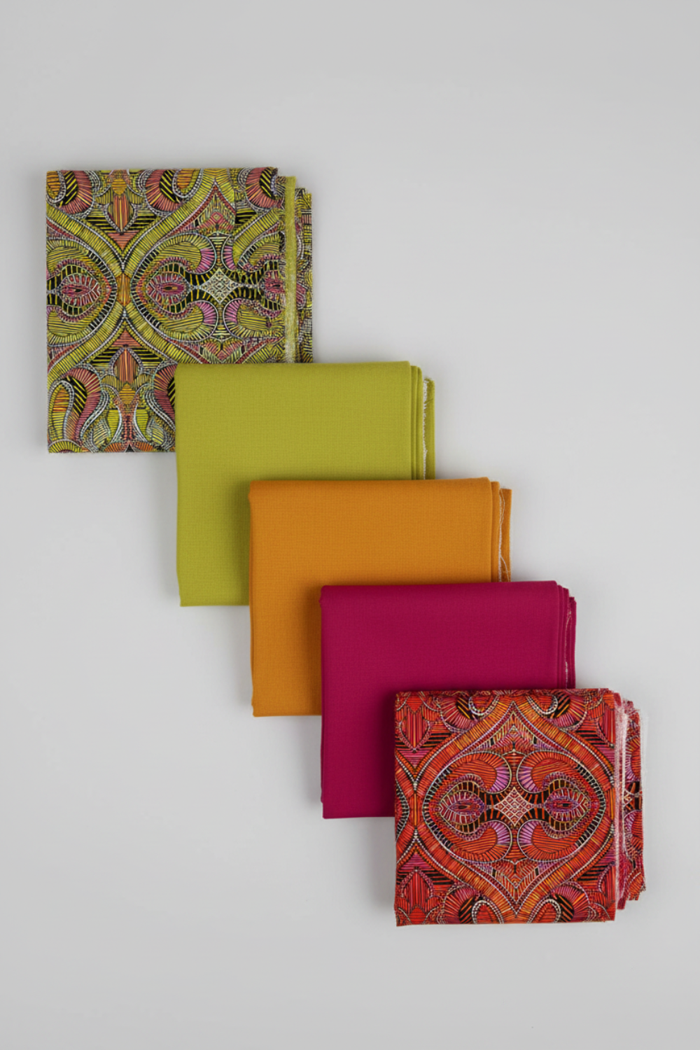 What If Good Vibes Gold/Multi fabric staircase with Interwoven Citron, Marigold, Magenta and Radio Star Red/Multi — quilting color palette by Paula Nadelstern for Benartex