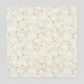 Winter Solstice II Cream Snowflakes Metallic quilting cotton by Jason Yenter for In The Beginning Fabrics — close-up flat lay showing tossed white snowflakes in multiple sizes with tiny scattered gold metallic star dots on warm mottled ecru and cream ground, 100% cotton with metallic accents, 43–44" wide. Coordinating fabrics and quilt patterns are available at IraRobi Quilts.