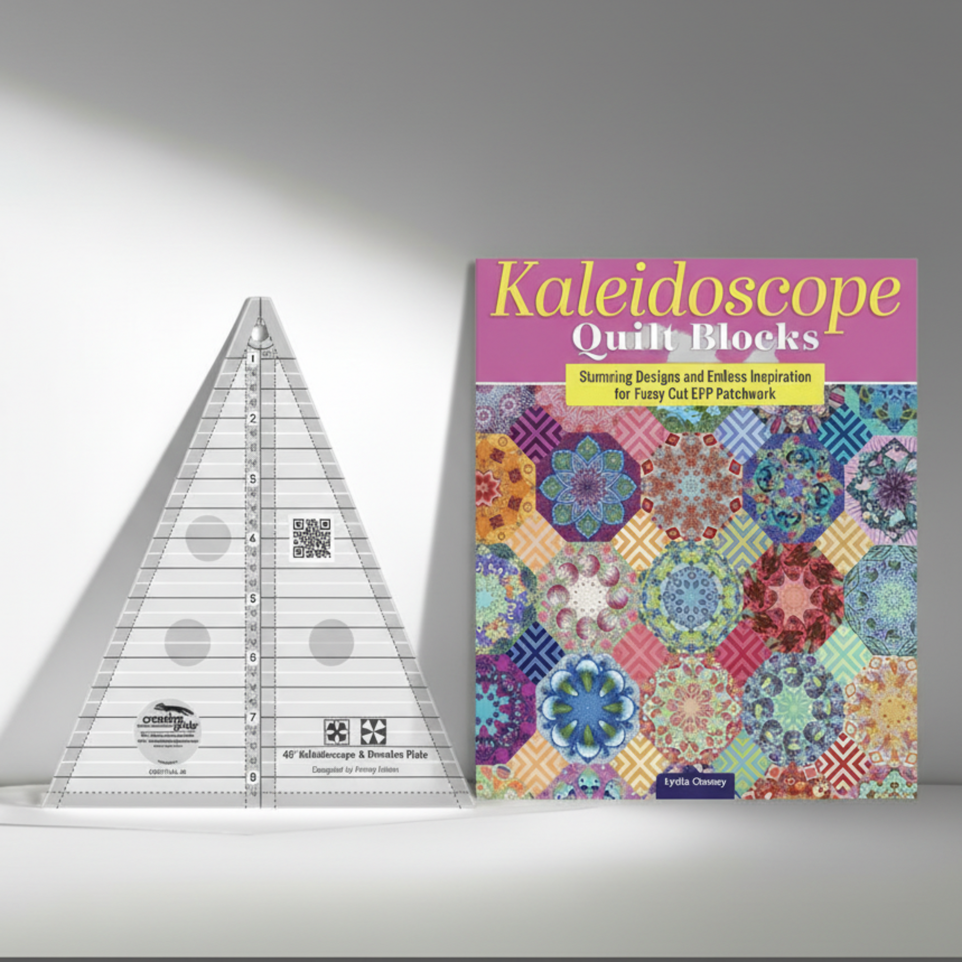 Creative Grids Kaleidoscope and Dresden Plate ruler shown with Kaleidoscope quilt block pattern book