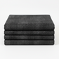 Interwoven Dark Slate quilting cotton folded into a neat 2–3 yard continuous stack showing full fabric width – deep dark charcoal geometric crosshatch fabric by Jason Yenter for In The Beginning Fabrics