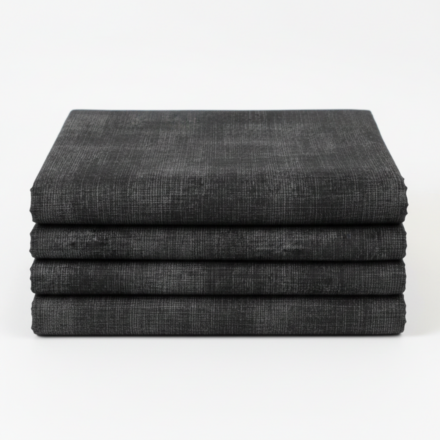 Interwoven Dark Slate quilting cotton folded into a neat 2–3 yard continuous stack showing full fabric width – deep dark charcoal geometric crosshatch fabric by Jason Yenter for In The Beginning Fabrics