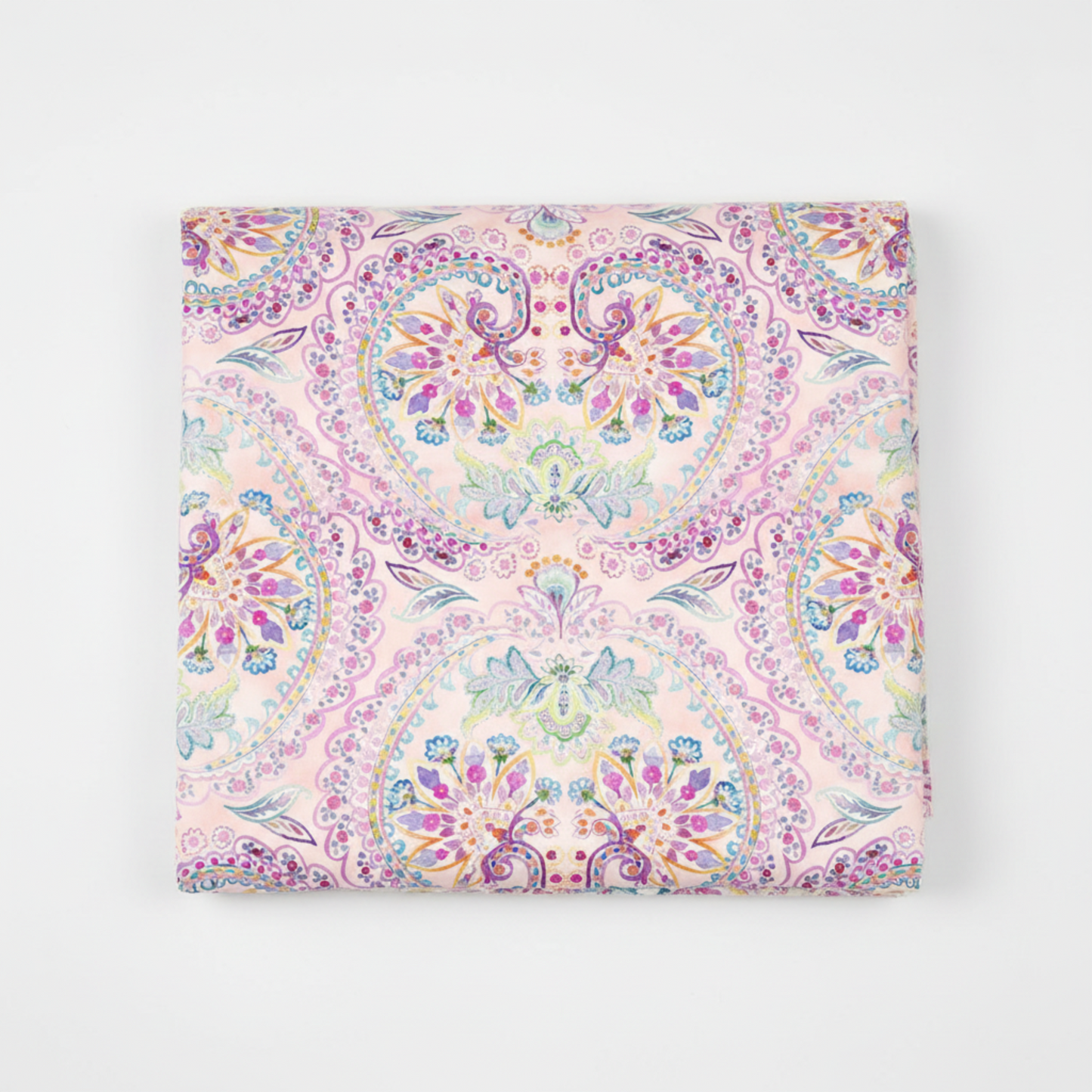 Daydreams Multi Floral Paisley quilting cotton fabric folded to show large-scale ornate floral medallion and paisley damask pattern – dreamy watercolor pastels of pink, lavender, purple, teal, and blue on soft blush ground by Jason Yenter for In The Beginning Fabrics, digitally printed, 100% cotton, 3 yard cut
