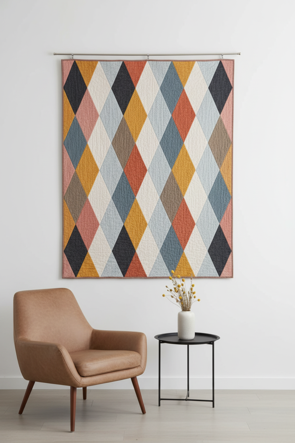 Thatched Heather soft grey-white crosshatch texture fabric by Robin Pickens for Moda Fabrics shown in a modern diamond quilt hung on a white wall — coordinating fabrics and quilt patterns available at IraRobi Quilts.