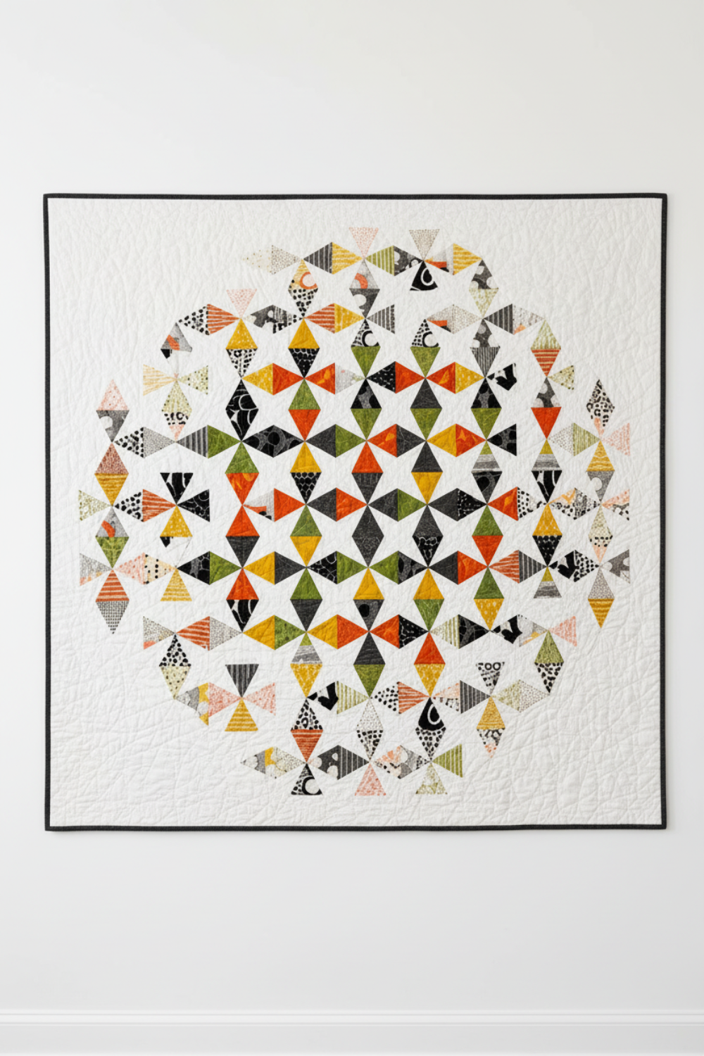 Quilt shown for inspiration features the Dissolve by Zen Chic, available at IraRobi Quilts. Texture Graphix Speckle Black quilting cotton by Jason Yenter for In The Beginning Fabrics.