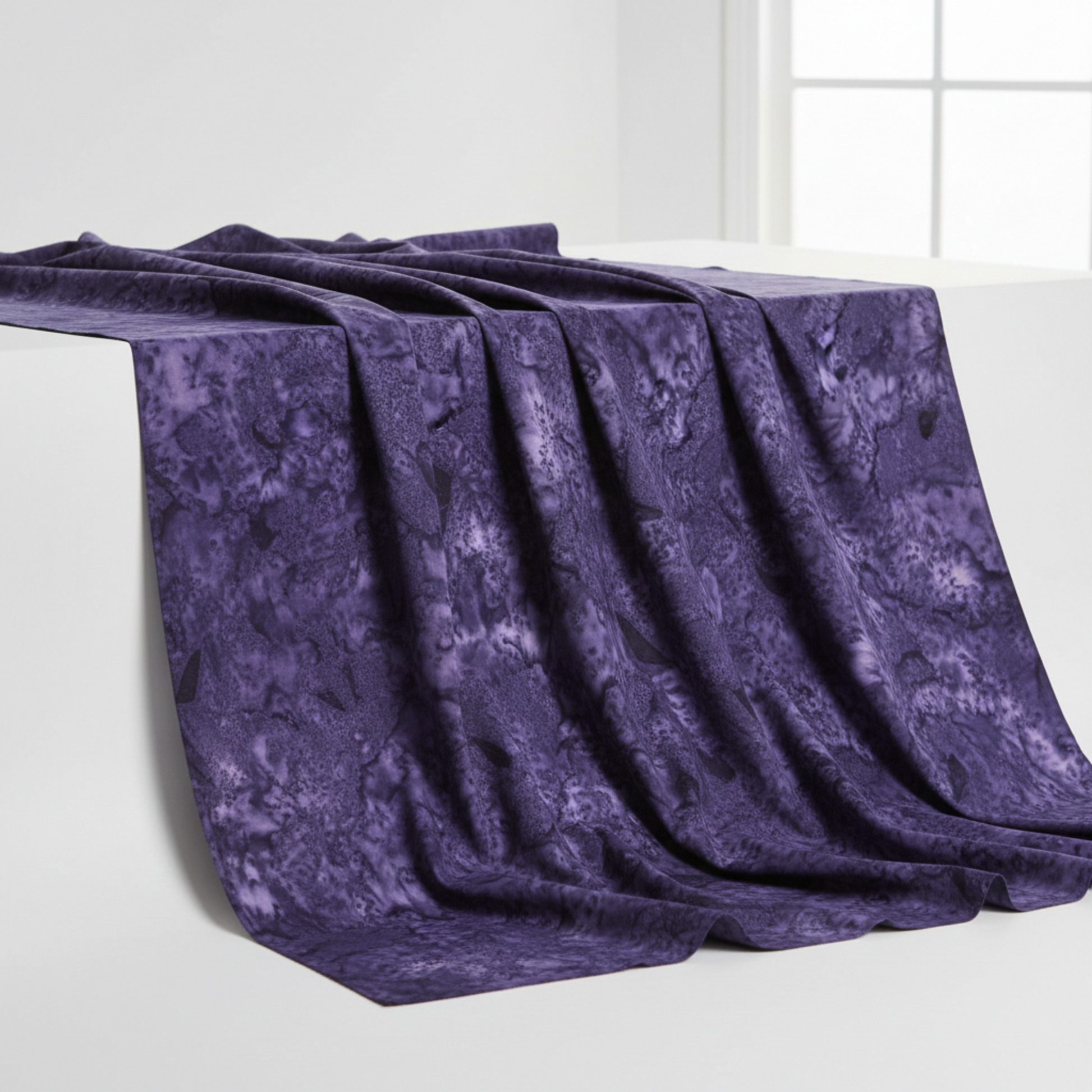 Expressions Batiks Hand-Dyes Dark Purple fabric draped to show organic tonal variation and hand-dyed batik texture – by Riley Blake Designs