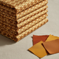 Falling Leaves Multi Prism fabric by Jason Yenter for In The Beginning Fabrics folded on a linen surface – allover geometric kaleidoscope prism pattern in warm golden amber and caramel tones, perfect for cozy autumn quilt projects, 100% cotton, 3 yard cut