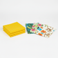 Safari Fun fat quarter bundle — yellow polka dot, tropical toucan, monkey, and jungle print quilting fabrics stacked and fanned on light grey background — IraRobi Quilts