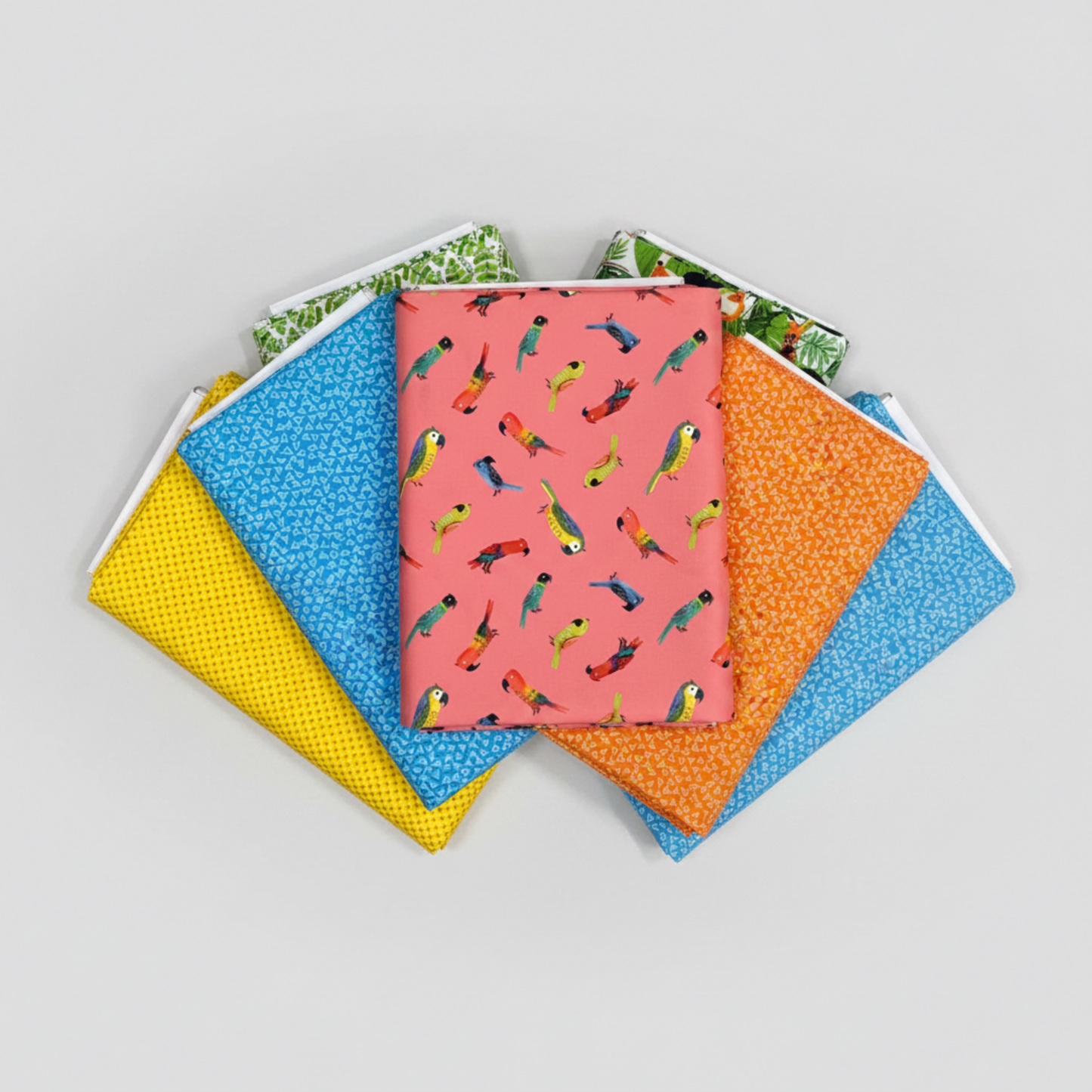 Safari Fun coordinating fat quarter bundle — Jungle Birds Sorbet parrot fabric with jungle leaves, blue triangles, orange, and yellow quilting fabrics — IraRobi Quilts
