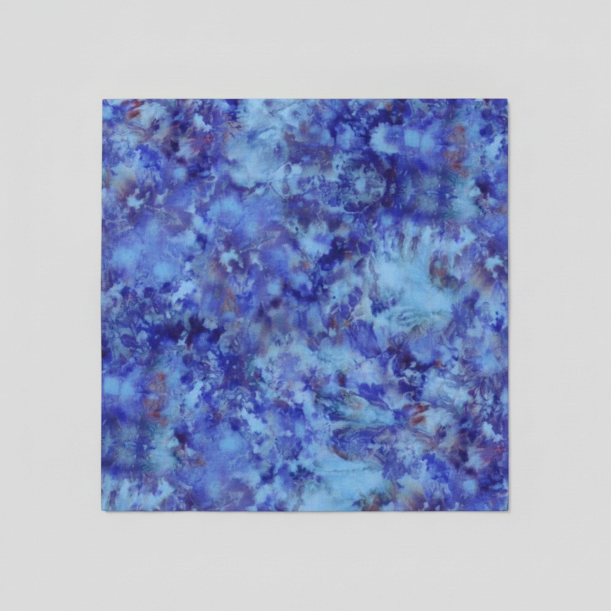 Fire & Ice by Maywood Studio Navy Ice Dye cotton quilting fabric folded flat showing full ice dye print in blue and purple tones on light grey background
