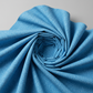 Safari Fun Floating Triangles Blue quilting fabric by Terry Runyan for Benartex – fabric dramatically swirled into a spiral funnel shape, light grey background