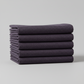 Thatched Shadow deep purple fabric by Robin Pickens for Moda Fabrics – neatly folded to show fabric texture and color depth. Coordinating fabrics and quilt patterns are available at IraRobi Quilts.