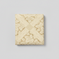 Vintage Charm Tan 108" Wide Quilt Back by Judie Rothermel for Marcus Fabrics – neatly folded yard showing tone-on-tone cream and gold lattice and leaf print on light grey background