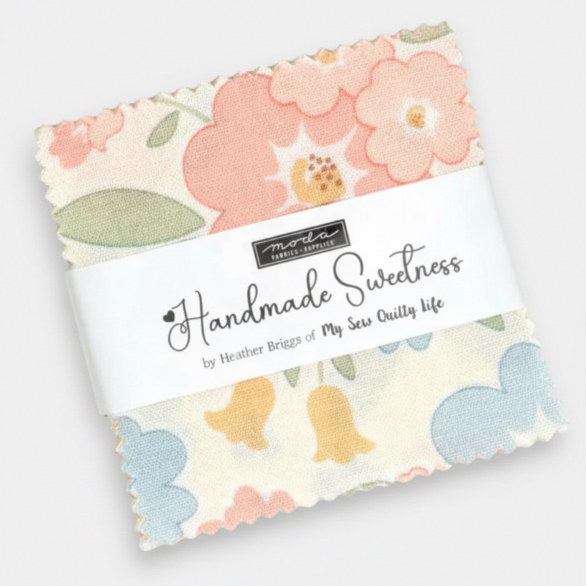 Handmade Sweetness Mini Charm Pack by Heather Briggs of My Sew Quilty Life for Moda Fabrics – factory-sealed 42-piece 2.5" x 2.5" cotton squares with large-scale blush pink florals, powder blue and golden yellow motifs on cream