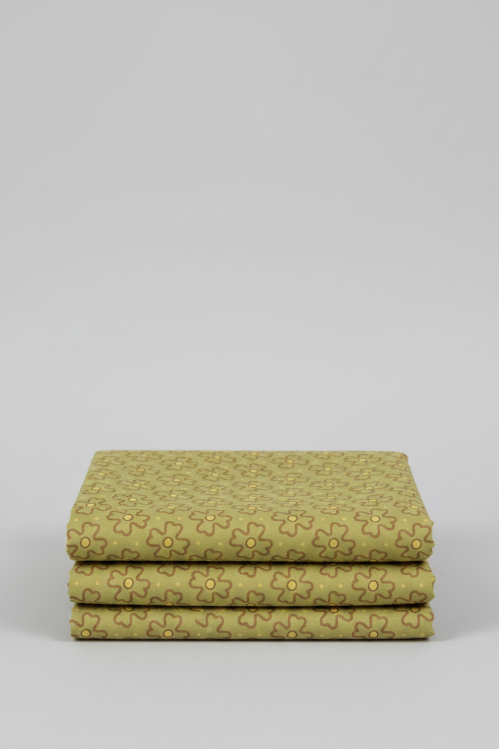 Golden Era Wavy Daisy Green by Paula Barnes for Marcus Fabrics — sage-olive green quilting cotton with all-over tossed wavy daisy motif in brown-taupe and gold, 100% cotton 43–44" wide — shop at IraRobi Quilts