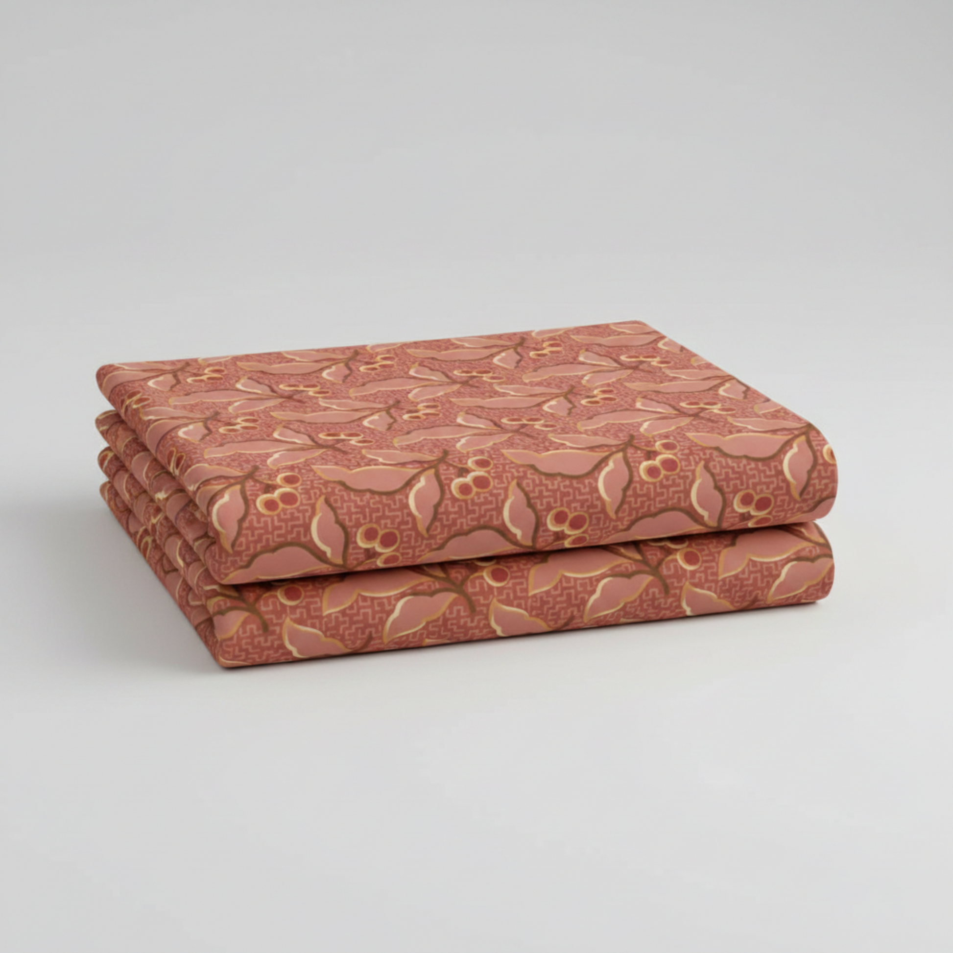 The Fox Homestead Pink Leaves And Berries quilting cotton by Stacy West for Henry Glass — neatly folded fabric showing dusty rose-terracotta ground with leaf-and-berry sprigs in gold, cream, and burgundy